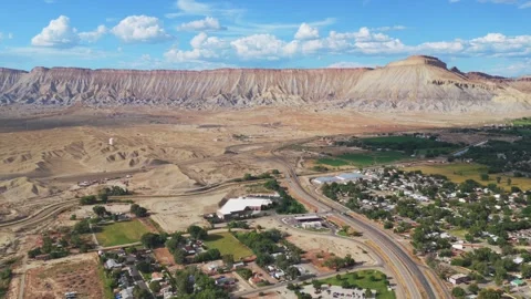 Book Cliffs Mesa Clifton Grand Junction aerial drone afternoon cloudy Grand 動画素材 343753814