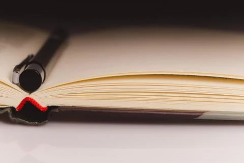 Book close up pencil partial light Stock Photos