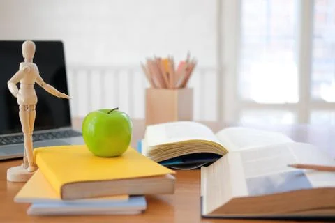 Book computer on desk table for studying. back to school &amp; education concept Stock Photos