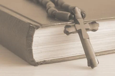 Book with a cross Stock Photos