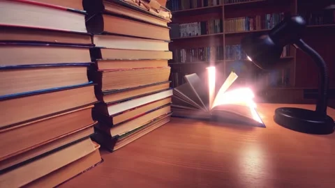 Book on desk in library at lamp Stock Footage 255001804