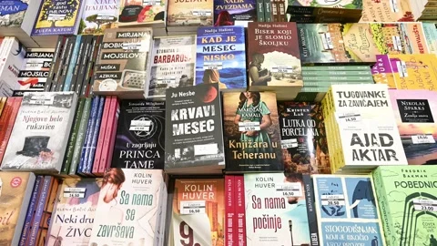 Book Fair. Book exhibition. Selection of books on display in store. Collection Stock Footage 238486672