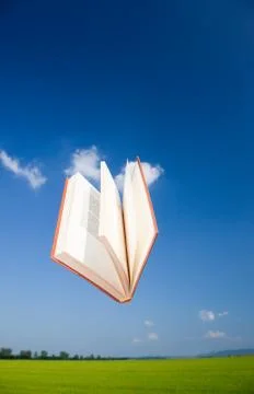 Book flying in the sky Stock Photos
