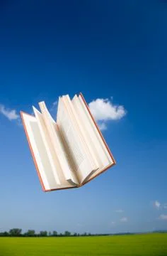 Book flying in the sky Stock Photos