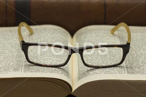 Book an glasses Stock Photos