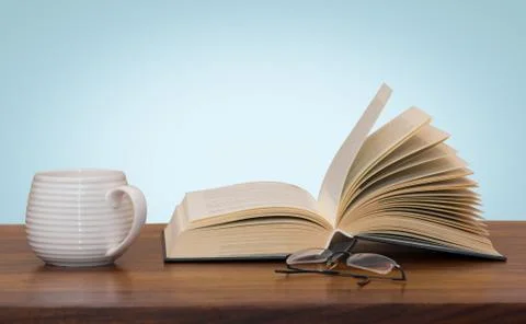 Book with glasses Stock Photos
