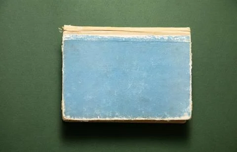 Book on the green background. Stock Photos