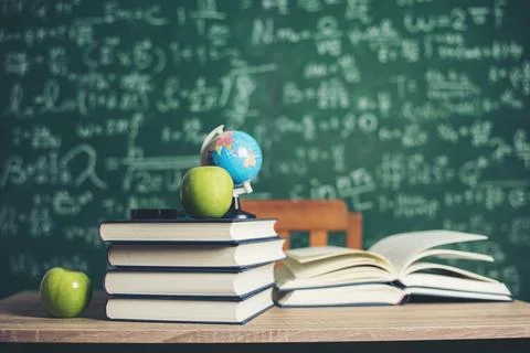 Book with green board background Stock Photos