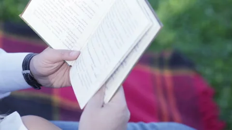 Book in hand Stock-Footage 43325763