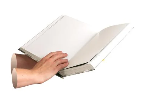 Book in hand open. Student holding textbook with clean sheet, story, fiction, Stock Photos