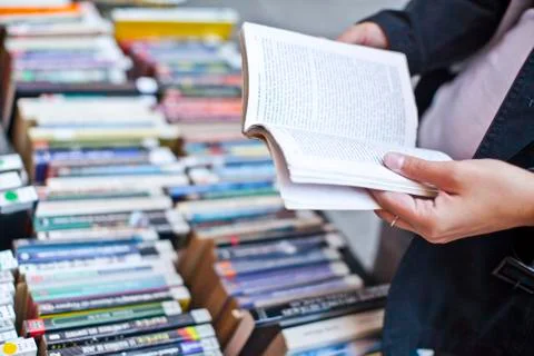 Book in the hand Stock Photos