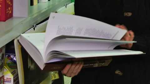 Book in Hands 1 Stock Footage 34522587