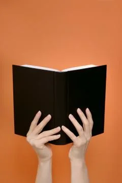 Book in hands Stock Photos