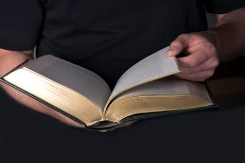 Book in the hands - studio shot for the background Stock Photos