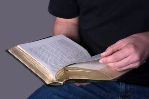 Book in the hands - studio shot for the background Stock Photos