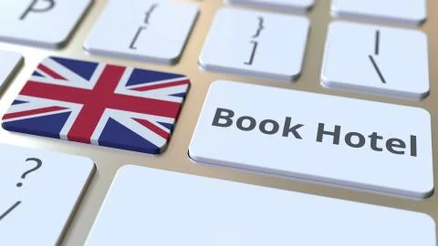 BOOK HOTEL text and flag of Great Britain on the buttons on the computer Stock Illustration
