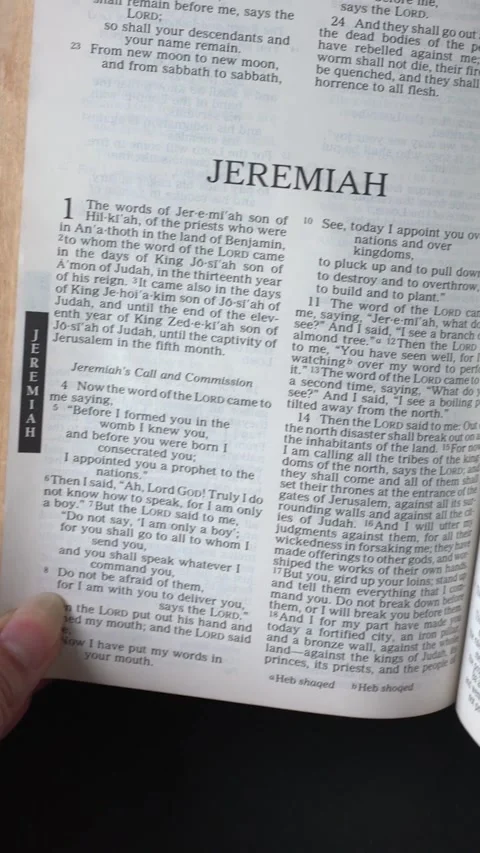 Book of Jeremiah of the Old Testament in the Holy Bible Stock Footage 340609280