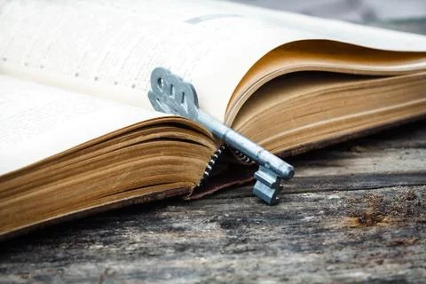 Book with key Stock Photos