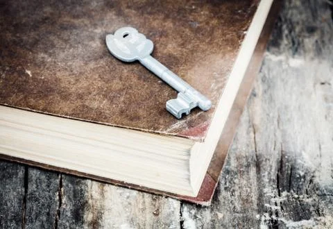 Book with key Stock Photos