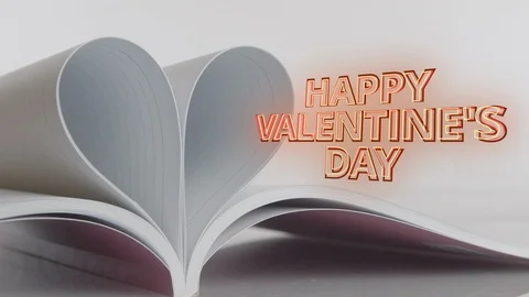 Book of love, the book page rolls into the heart - Valentine's day concept Stock Footage 122556489