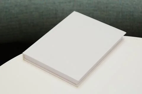 Book mockup on coffee table soft light Stock Photos