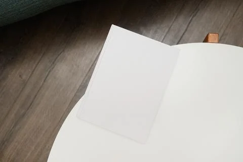 Book mockup on coffee table soft light Stock Photos