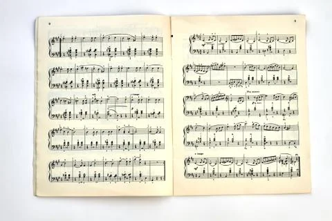 Book with musical notes. Stock Photos