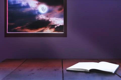 Book open dramatic feeling with moon light in midnight Stock Photos