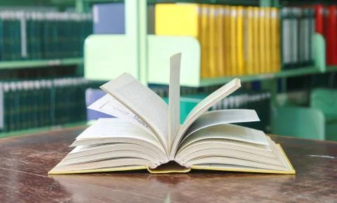 A book opened on table Stock Photos