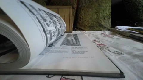 Book opening close shot slow-motion Stock Footage 200354891