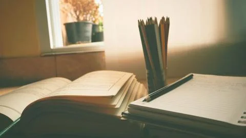 A book is opening on desk Stock Photos