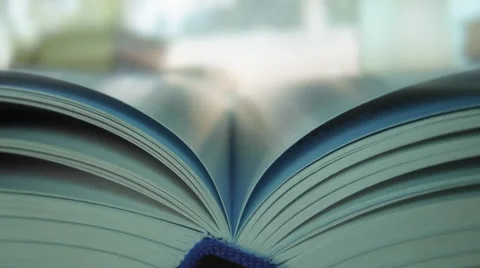 Book opening with turning several pages in the interior Stock Footage