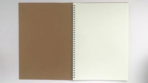 Book opens to white blank page for writing. Stop motion animation Stock Footage 143521263