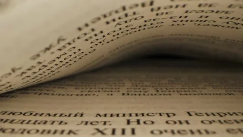 Book page super closeup in motion 動画素材 233033587