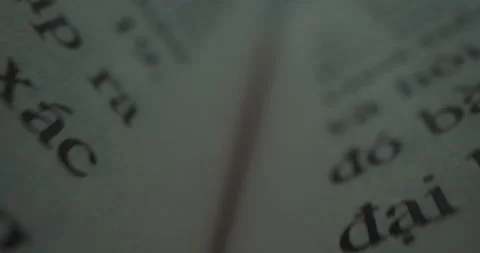Book sheets close-up with text english. Macro view shot moves between the pages Stock Footage 231807488