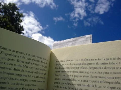 Book sky blue cloud reading Stock Photos