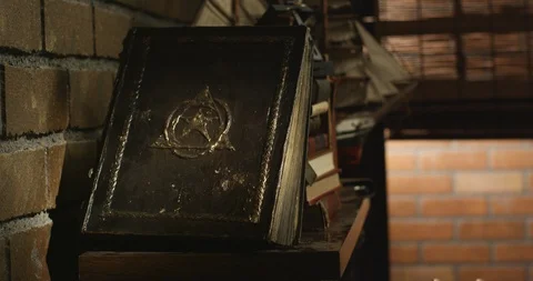 Book of Spells on Dusty Shelf 스톡 동영상 125904368