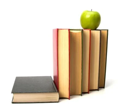 Book stack with apple isolated on white background Stock Photos