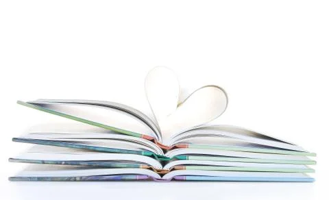 Book stack page in heart shape. Stock Photos