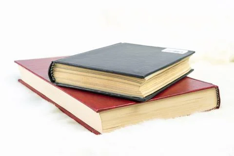 Book stacked on table Stock Photos