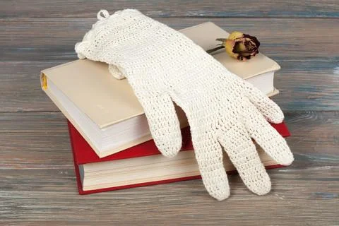 Book stacking. Open book, hardback books on wooden table background. Back t.. Stock Photos