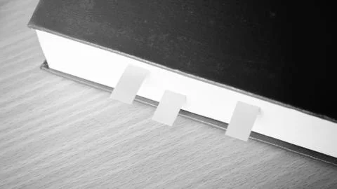 Book with sticky note Stock Photos