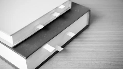 Book with sticky note Stock Photos