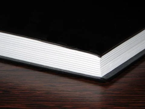 Book on a table. The pages of a book Фото