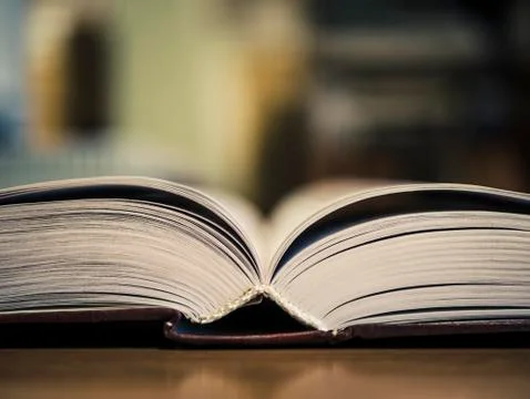 Book on the table selective focus close view Stock Photos