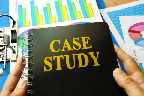 Book with title case study in an office. Stock Photos