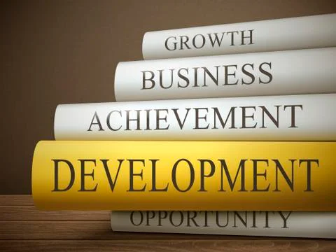 Book title of development isolated on a wooden table Stock Illustration