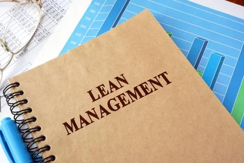 Book with title lean management on a table. Stock Photos