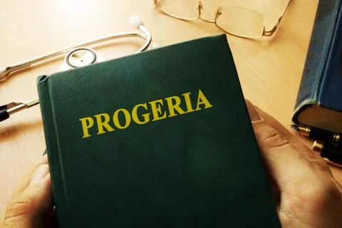 Book with title Progeria on a table. Foto stock