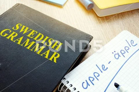 Book with title Swedish grammar and notebook Stock Photos